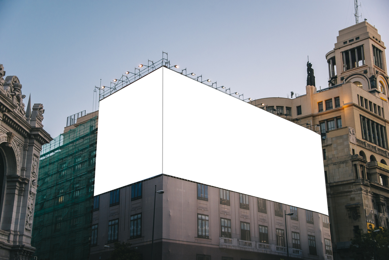 A blank billboard on a building.